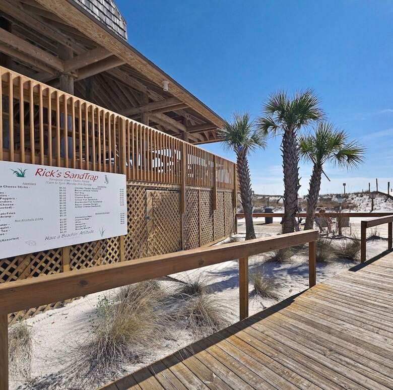 Rick's SandTrap beach bar and grill on the boardwalk at Sandpiper Cove